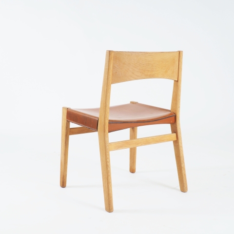 Dining chairs in oak and leather by John Vedel-Rieper